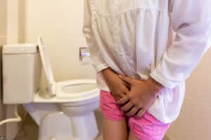 Woman,With,Hands,Holding,Her,Crotch,urinary,Tract,Infection,Concept